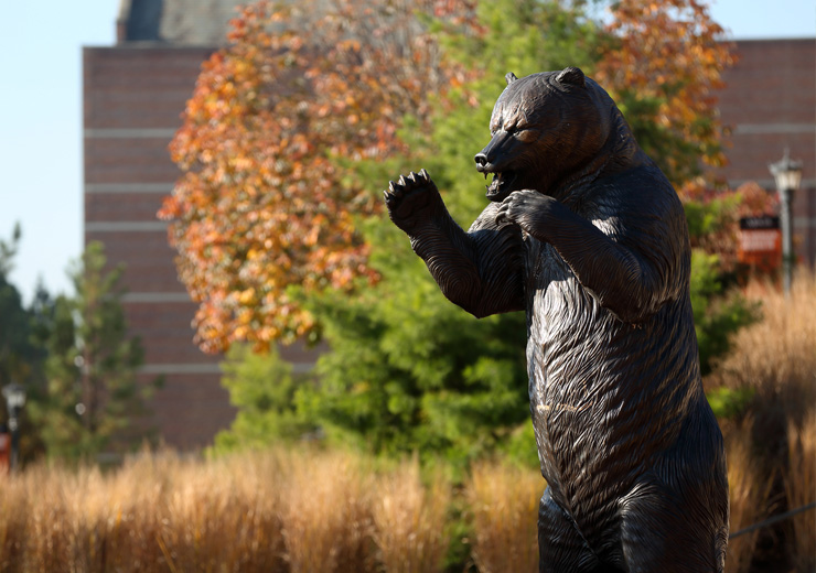 Bronze bear statue on the Macon campus